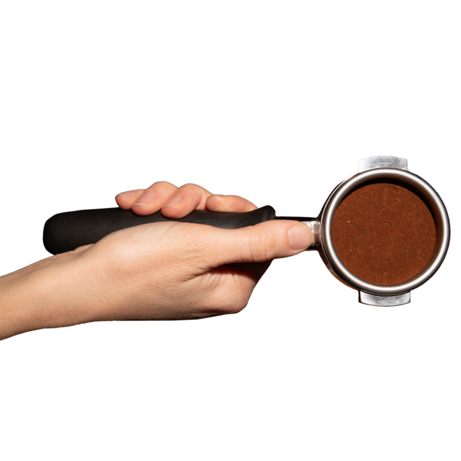 Portafilter in hand, with ground coffee